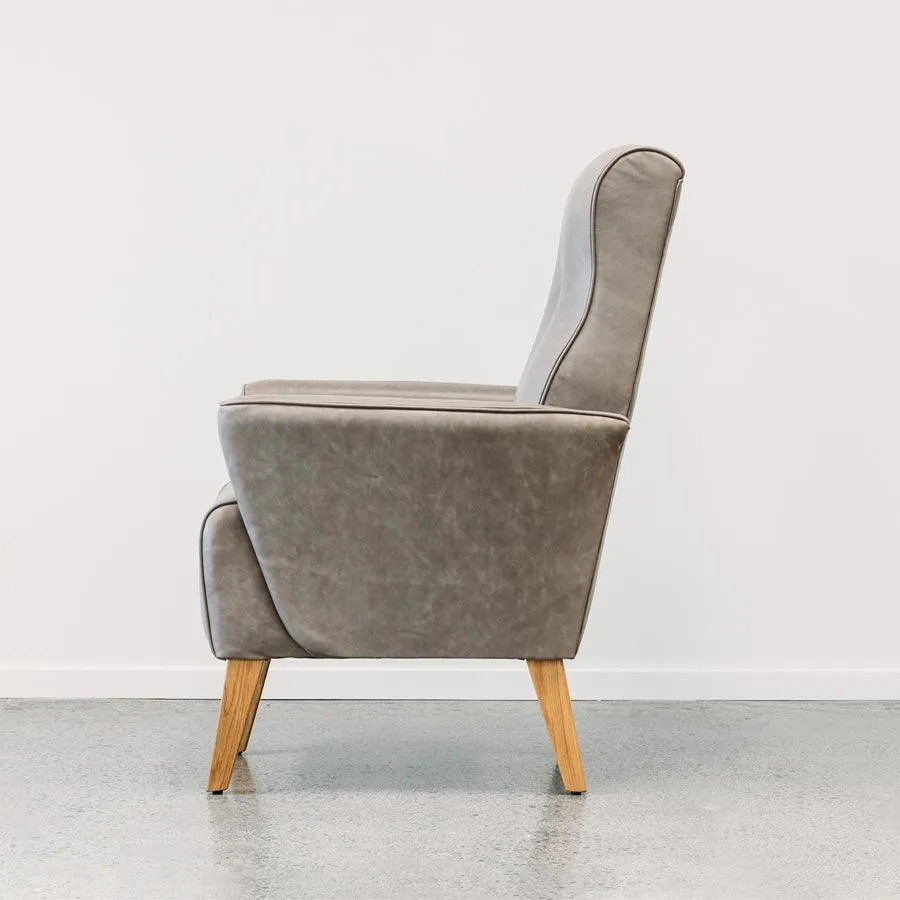 Lily leather armchair in coronet grey